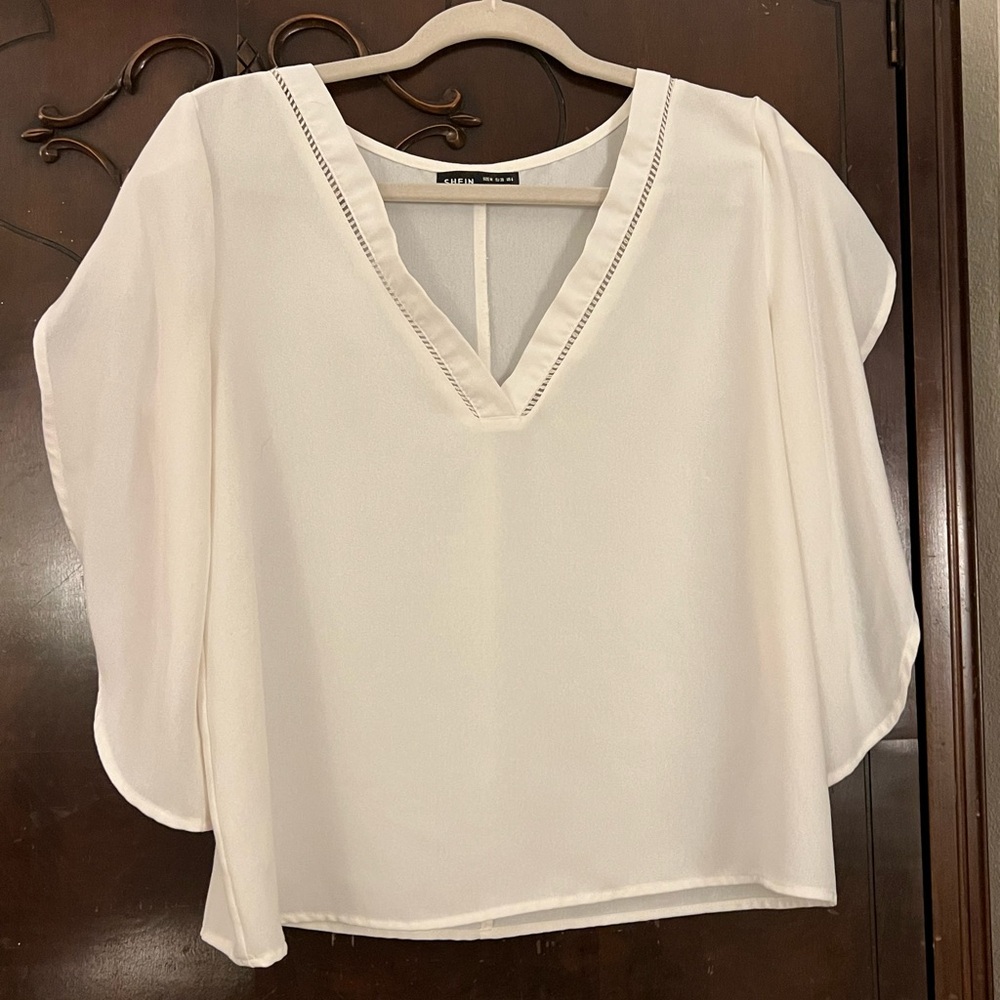 White Blouse with Long Petal Sleeves and neckline detail. Size 6